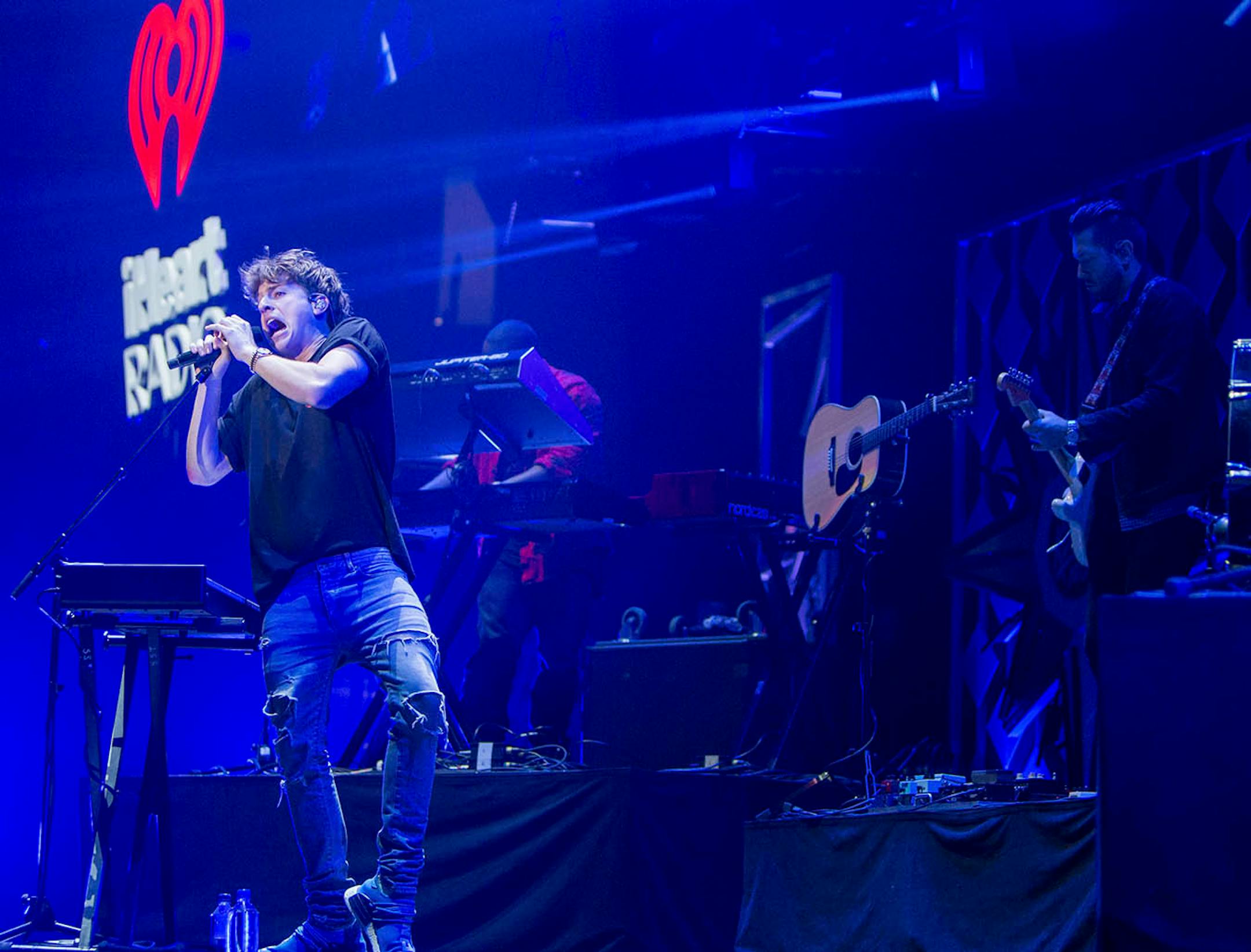 Charlie Puth performs at Jingle Ball.