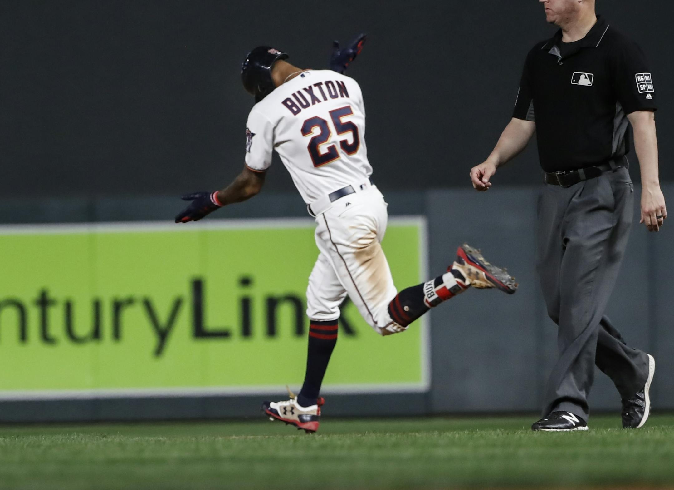Minnesota Twins center fielder Byron Buxton (25) celebrated his bottom of the tenth inning home run to win the game 3/2.
