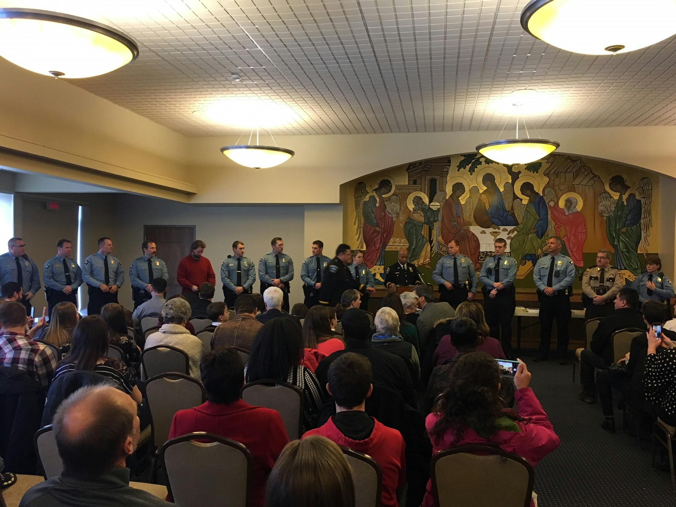 Dozens of Minneapolis police officers and civilians received awards for bravery and lifesaving efforts Monday.