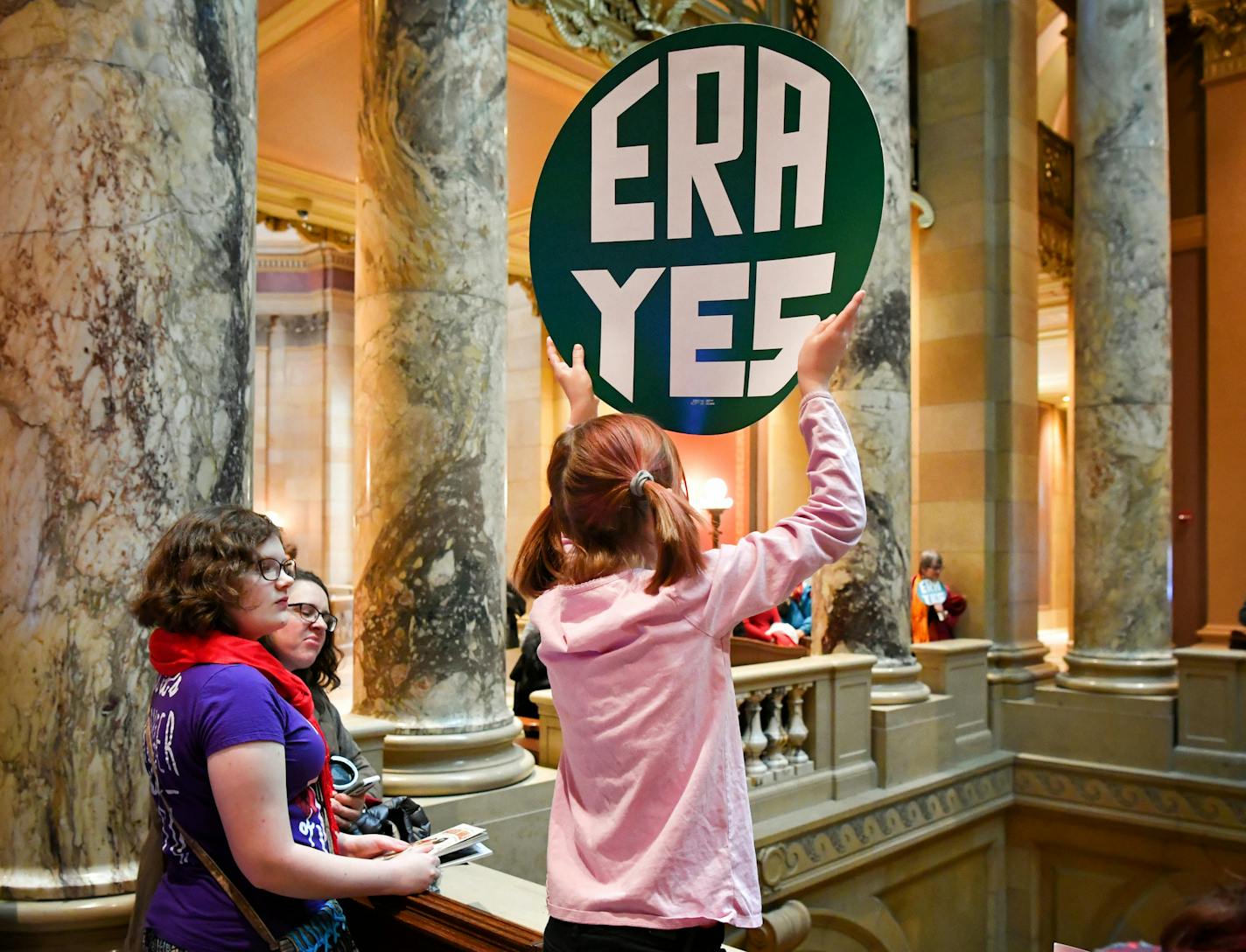 After a press conference calling for the passage of the long-sought Equal Rights Amendment, women gathered in support are fanning out across the State Capitol.