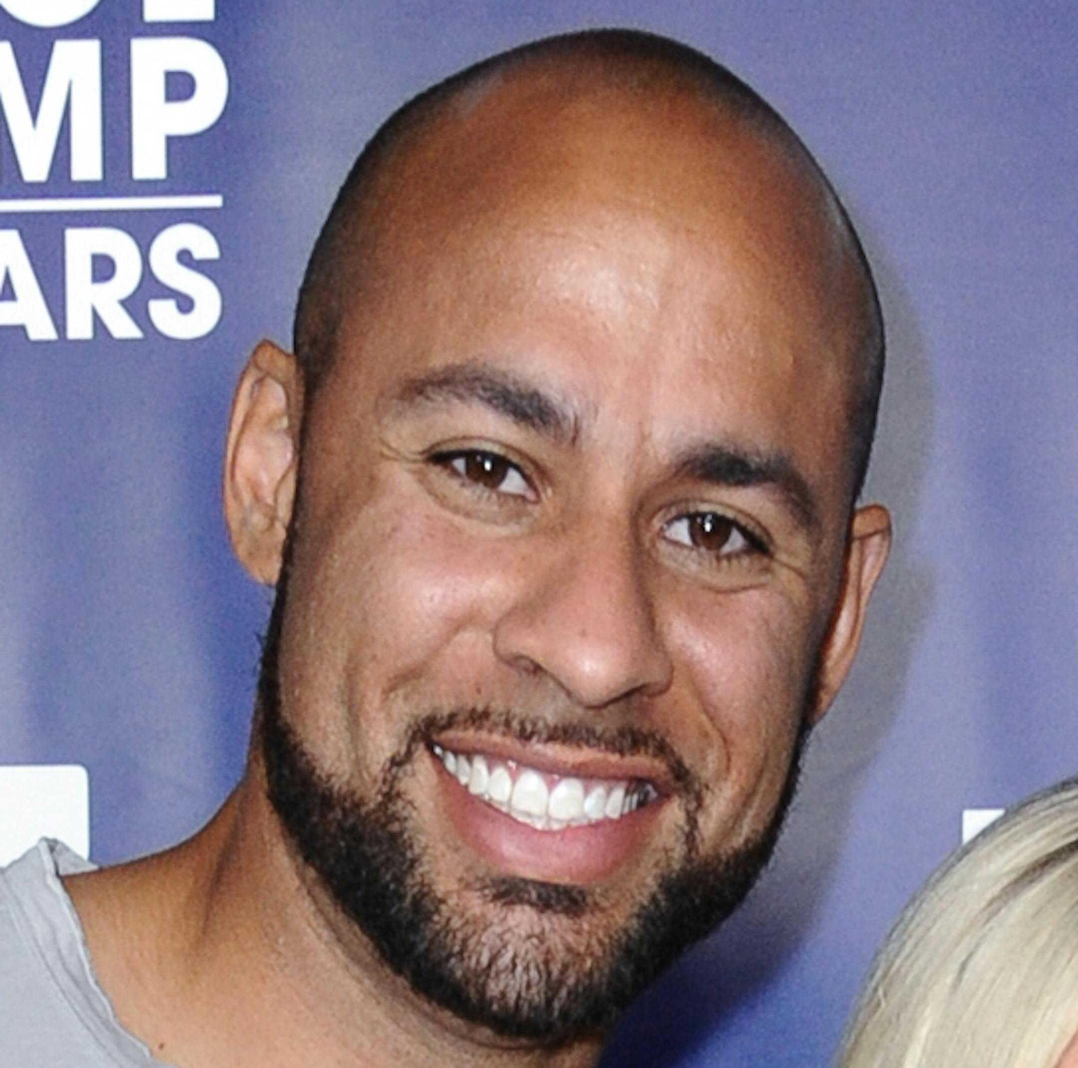 Hank Baskett, left, and Kendra Wilkinson arrive at the Marriage Boot Camp Reality Stars Premiere Party held at Hyde Sunset on Thursday, May 28, 2015, in Los Angeles. (Photo by Richard Shotwell/Invision/AP) ORG XMIT: MIN2015061716254648