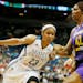 In this file photo, Maya Moore drove to the lane on Sparks Jantel Lavender during WNBA action between the Minnesota Lynx and Los Angeles Sparks at Tar