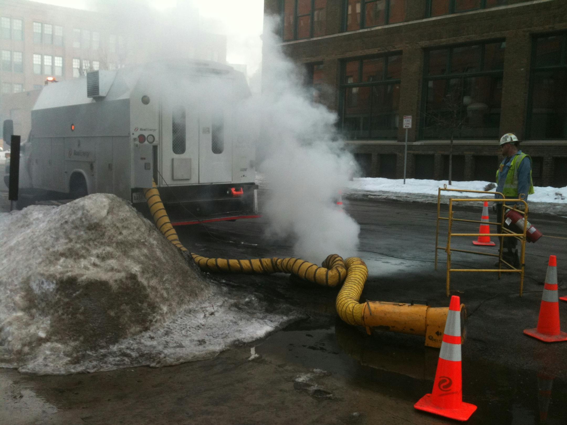 The fire was burning inside a manhole near 210 Second St. N.