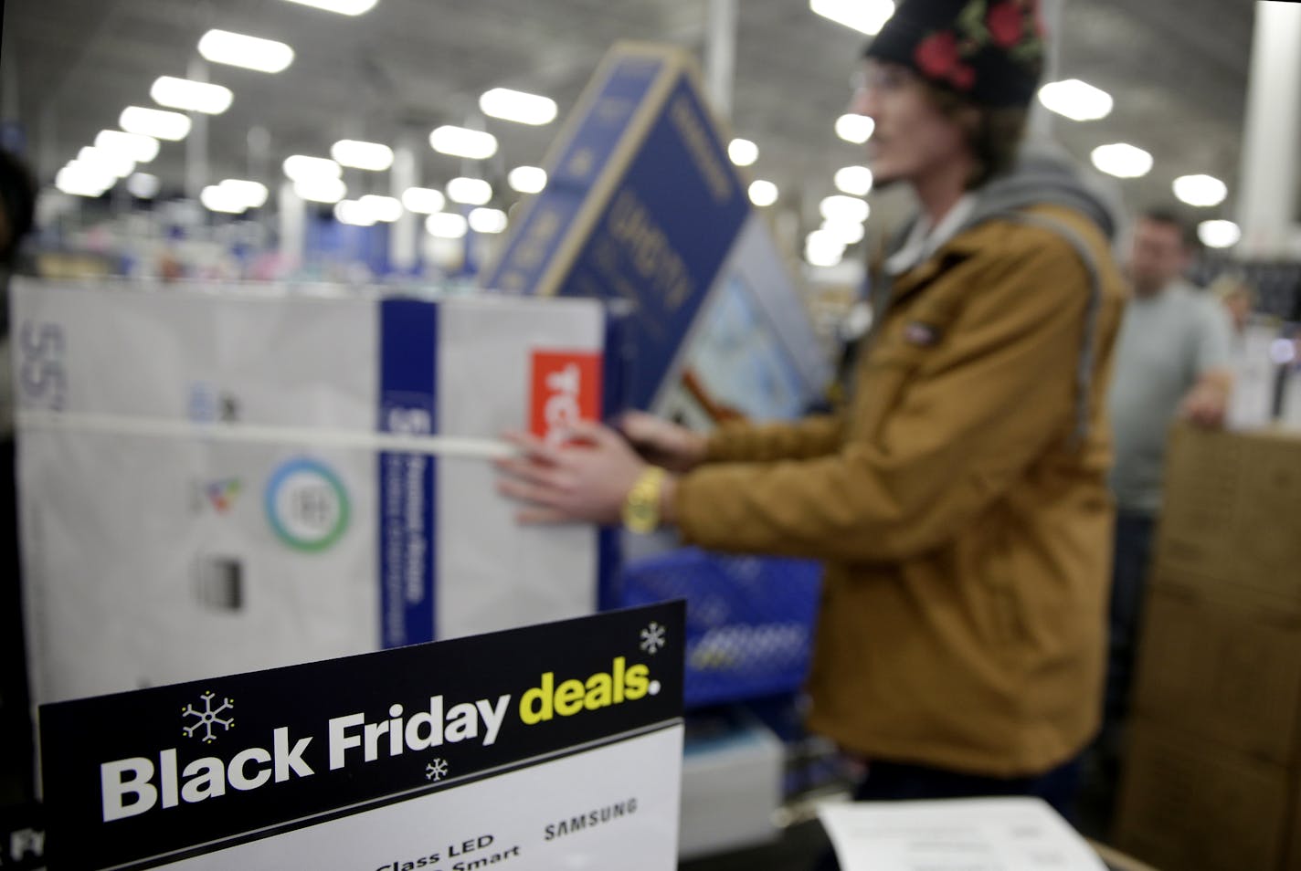 Best Buy is offering a price guarantee during its Magnolia brand promotion. It will refund the difference if Black Friday prices are less. (AP Photo/Charlie Riedel, File)