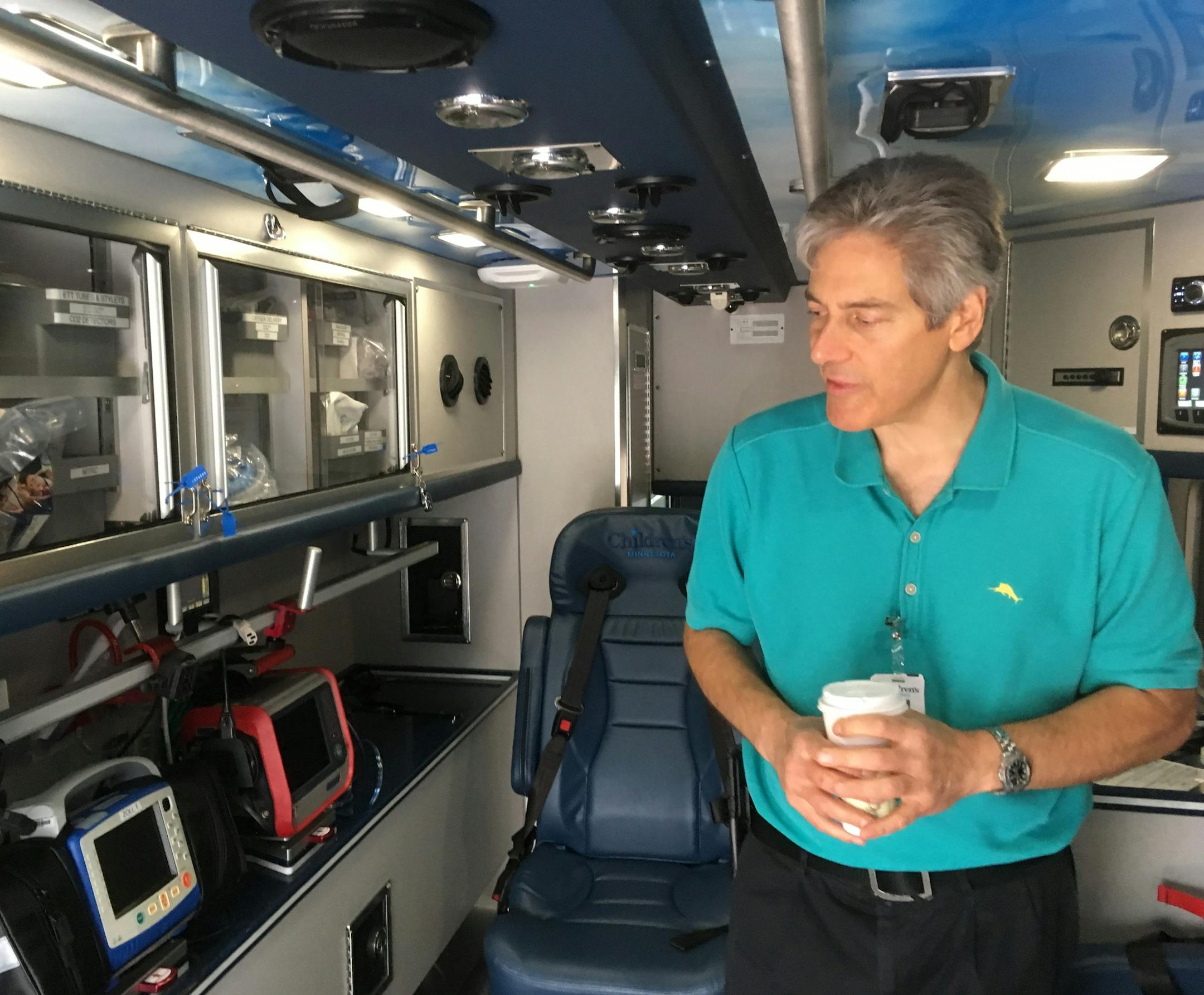 Dr. David Hirschman, medical director of the critical care transport program at Children&#xed;s Minnesota, inside one of the two new ambulance rigs.