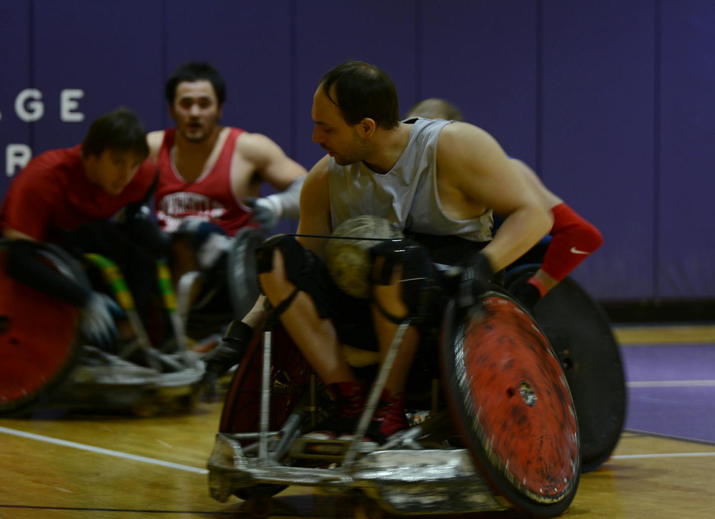 Eddie Brosnan, of Apple Valley, takes possession of the ball during a quad rugby practice in Golden Valley. Photo by Liz Rolfsmeier, Special to the Star Tribune