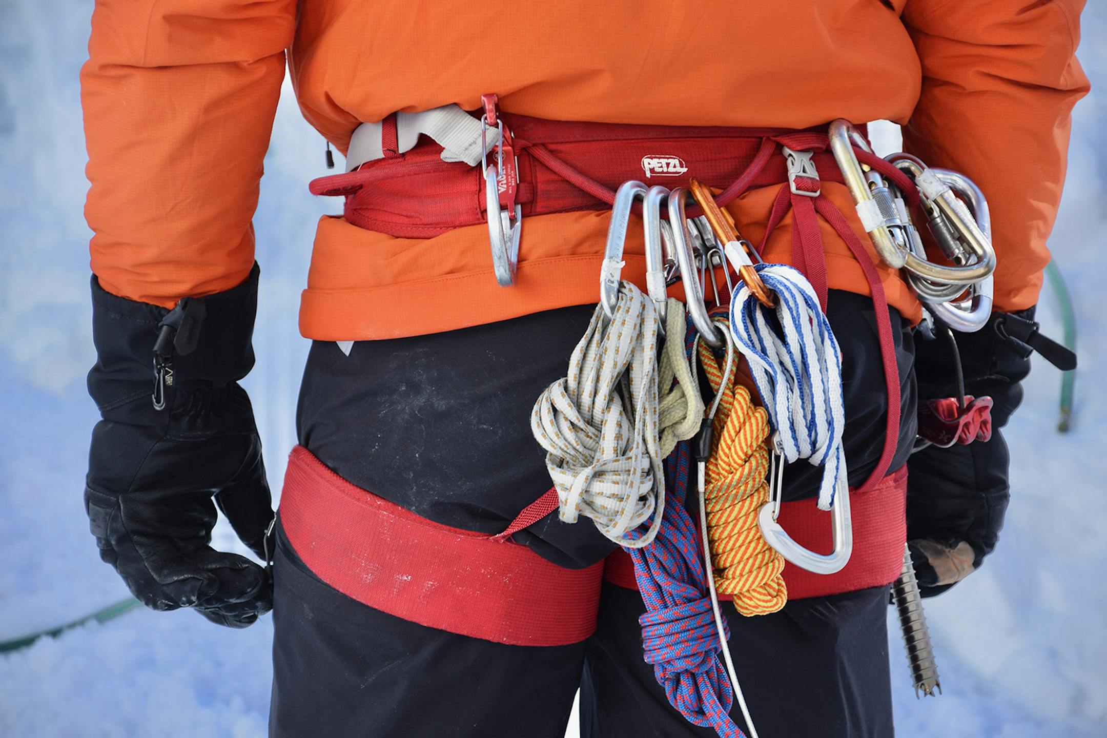 Larry Shiu, a teacher with Yamnuska Mountain Adventures, keeps extra ropes and carabiners on his harness. (Mark Johanson/Chicago Tribune/TNS)