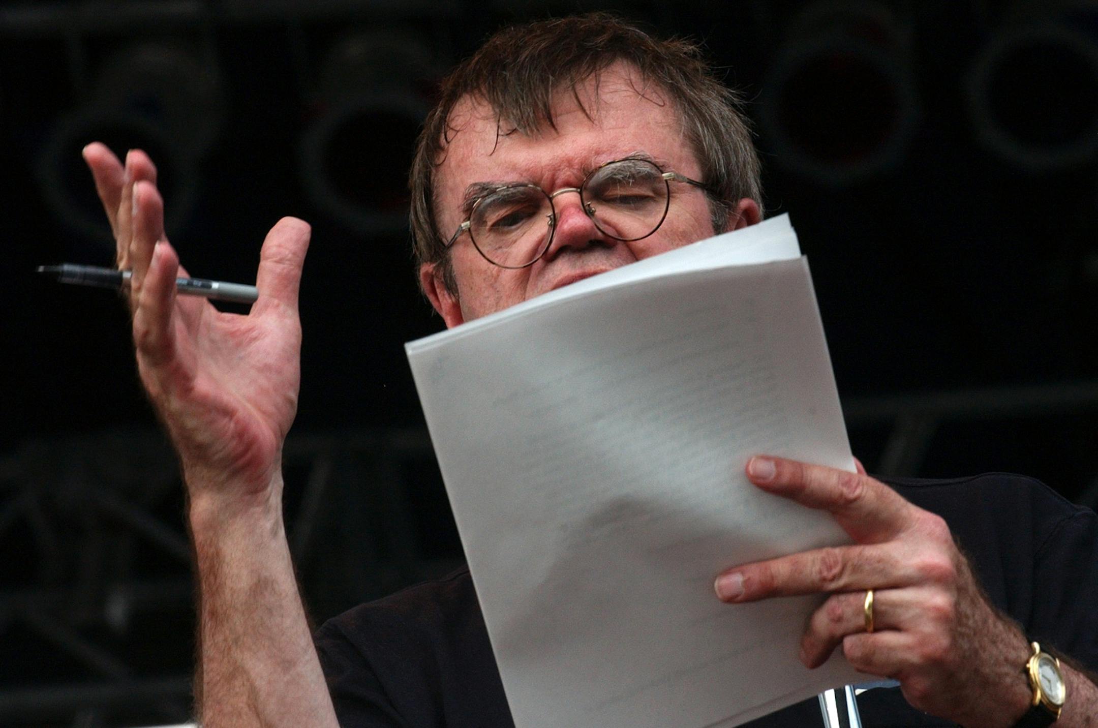 Falcon Heights,Mn.,Sat.,Sept. 4, 2004--Pen in hand for editing the script, Garrison Keillor rehearses a skit before appearing at the Minnesota State Fair.