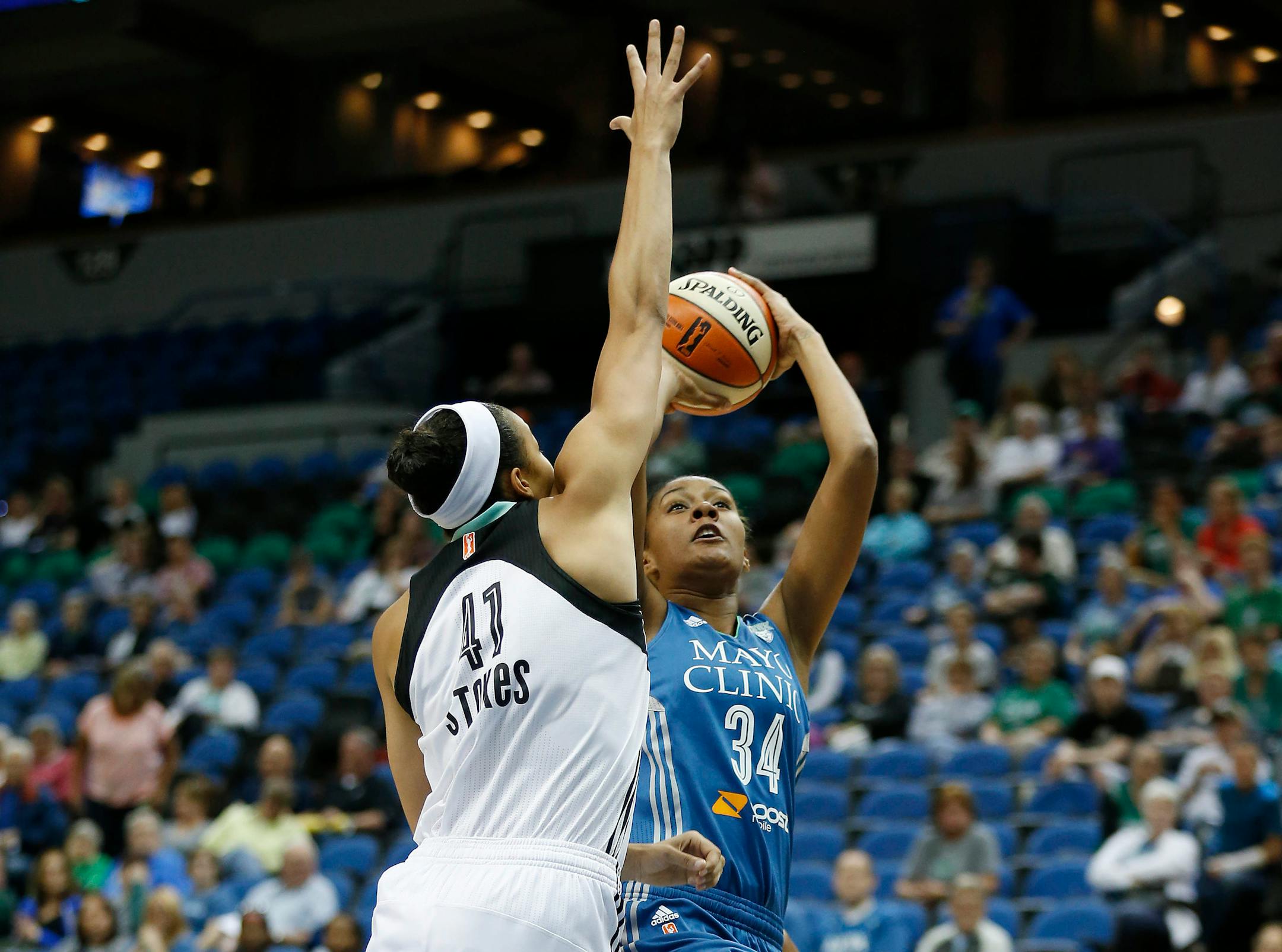 Lynx forward Damiris Dantas took a shot against New York Liberty center Kiah Stokes during the first half of Monday night's exhibition game at Target Center. Dantas scored 15 points as the Lynx won 85-80.