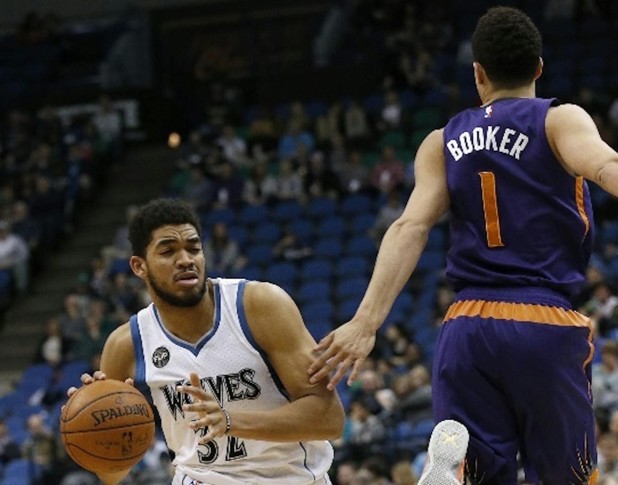 Timberwolves center Karl-Anthony Towns and Suns guard Devin Booker (2016 file photo), former college teammates at Kentucky, will face each other Monday night at Target Center.