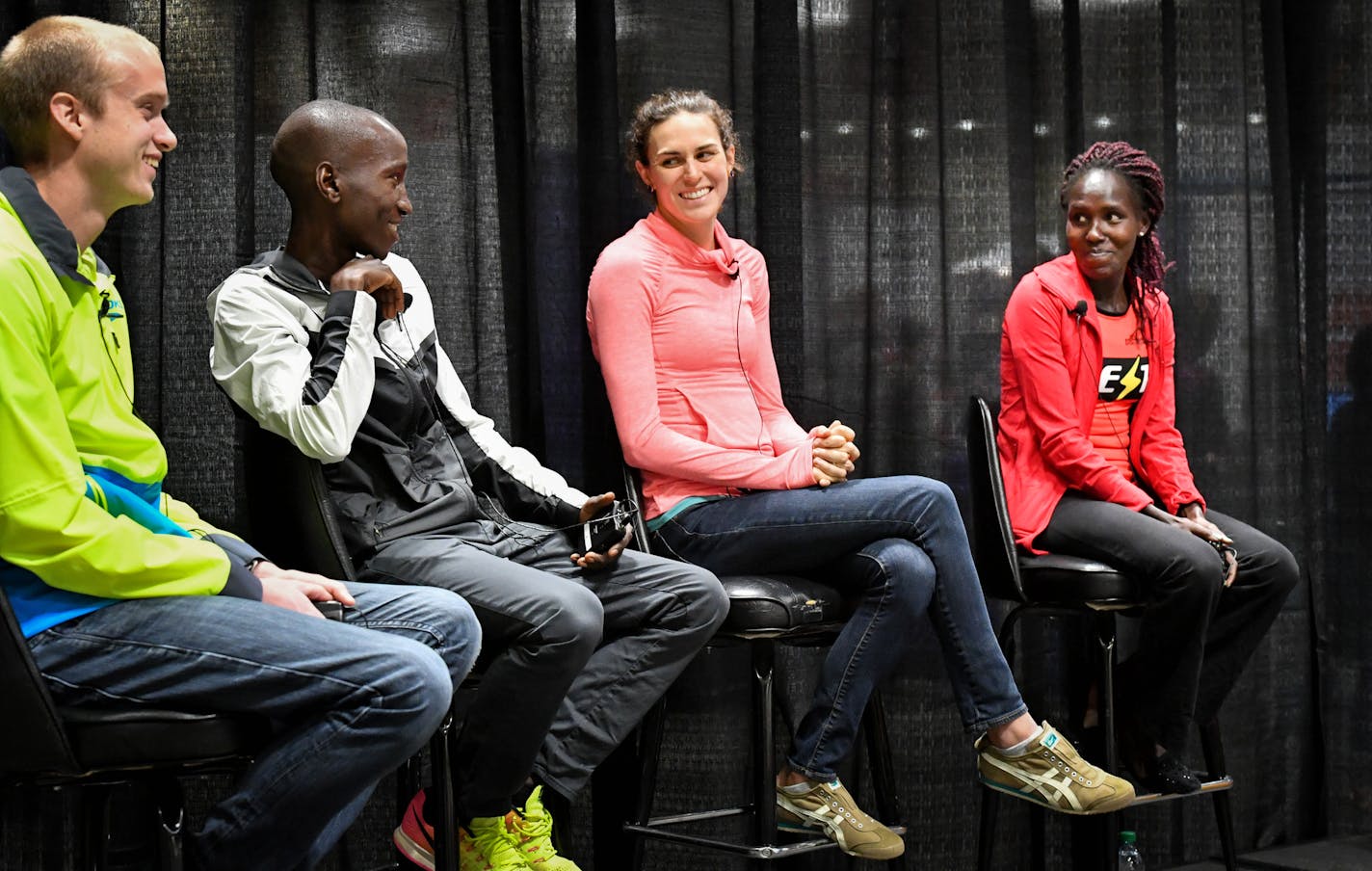 10-milers Josh Dedering, Sam Chelanga, Gwen Jorgensen and Aliphine Tuliamuk at the Twin Cities Marathon press conference. ] GLEN STUBBE * gstubbe@startribune.com Friday, October 7, 2016 Press conference with the top athletes at the Twin Cities Marathon on Sunday. Should get something of the top runners, and also something feature-like of runners picking up bibs, something like that, at the accompanying Health & Fitness Expo. EDS, L to R