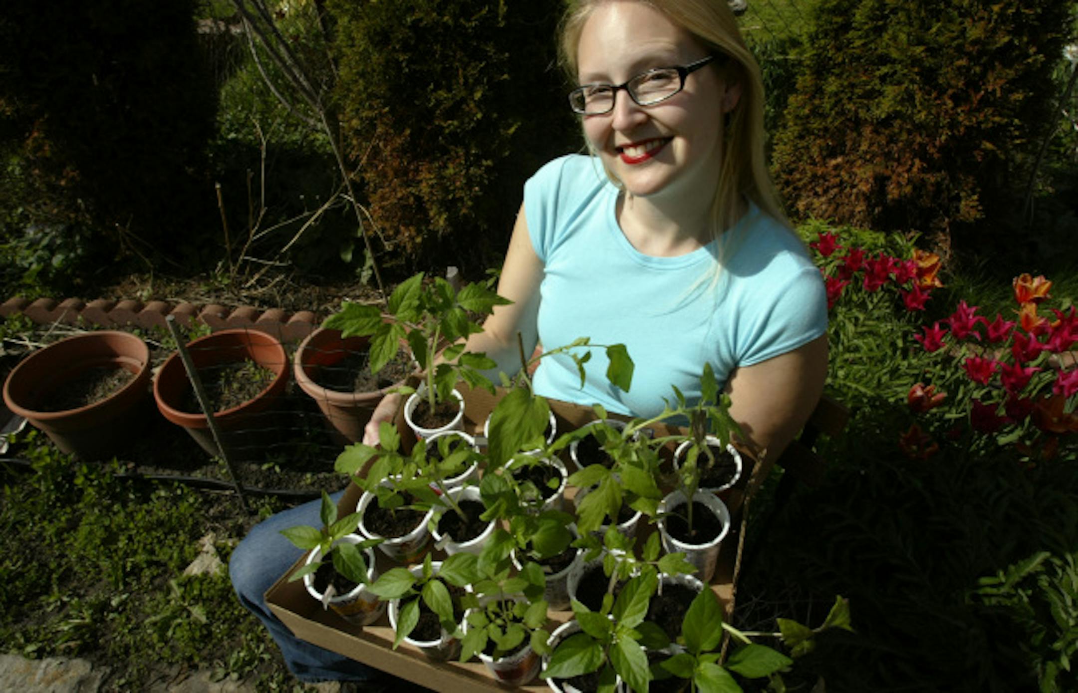 Lori Erickson, a veggie gardener and garden blogger, has 30 to 40 seedlings that she started in pots.