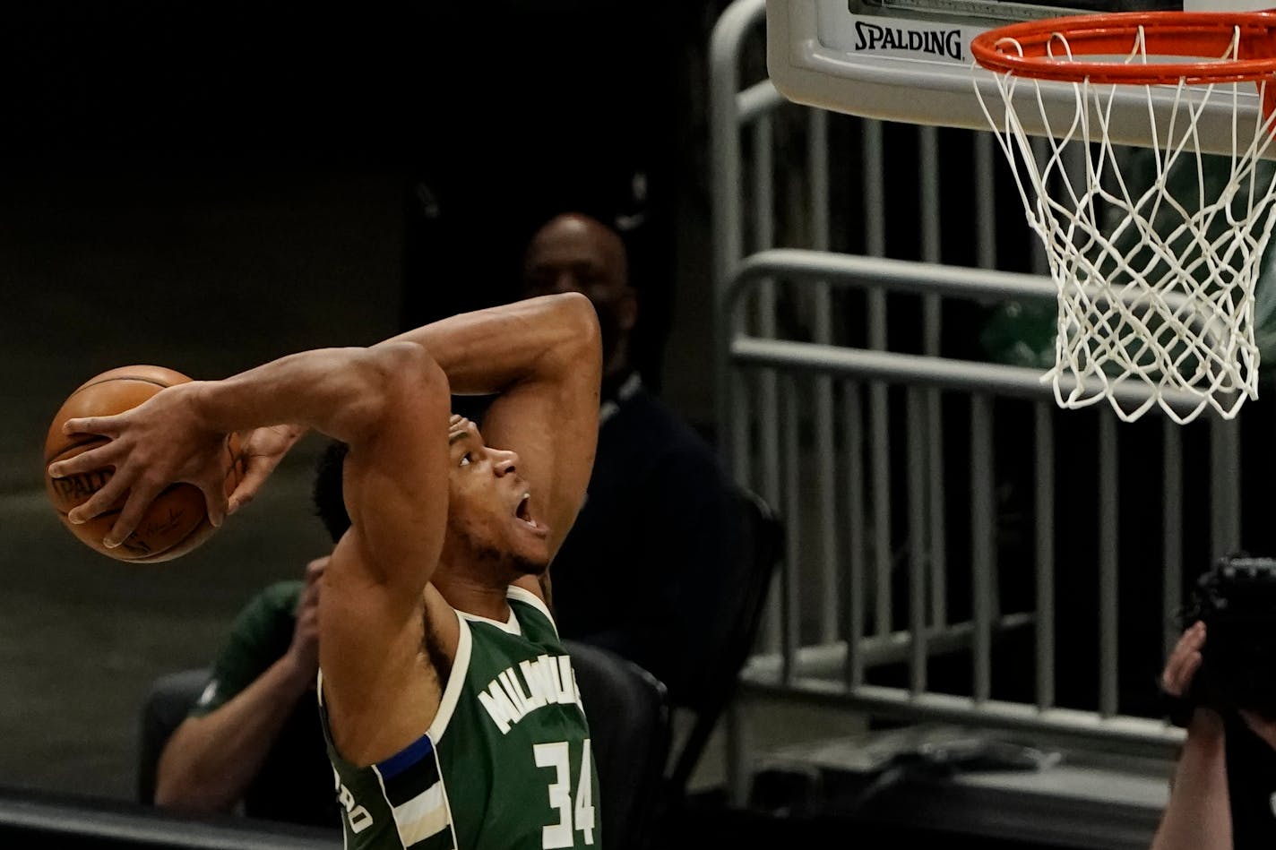 Milwaukee Bucks' Giannis Antetokounmpo goes up for a dunk during the first half of an NBA basketball game against the Sacramento Kings Sunday, Feb. 21, 2021, in Milwaukee. (AP Photo/Morry Gash)