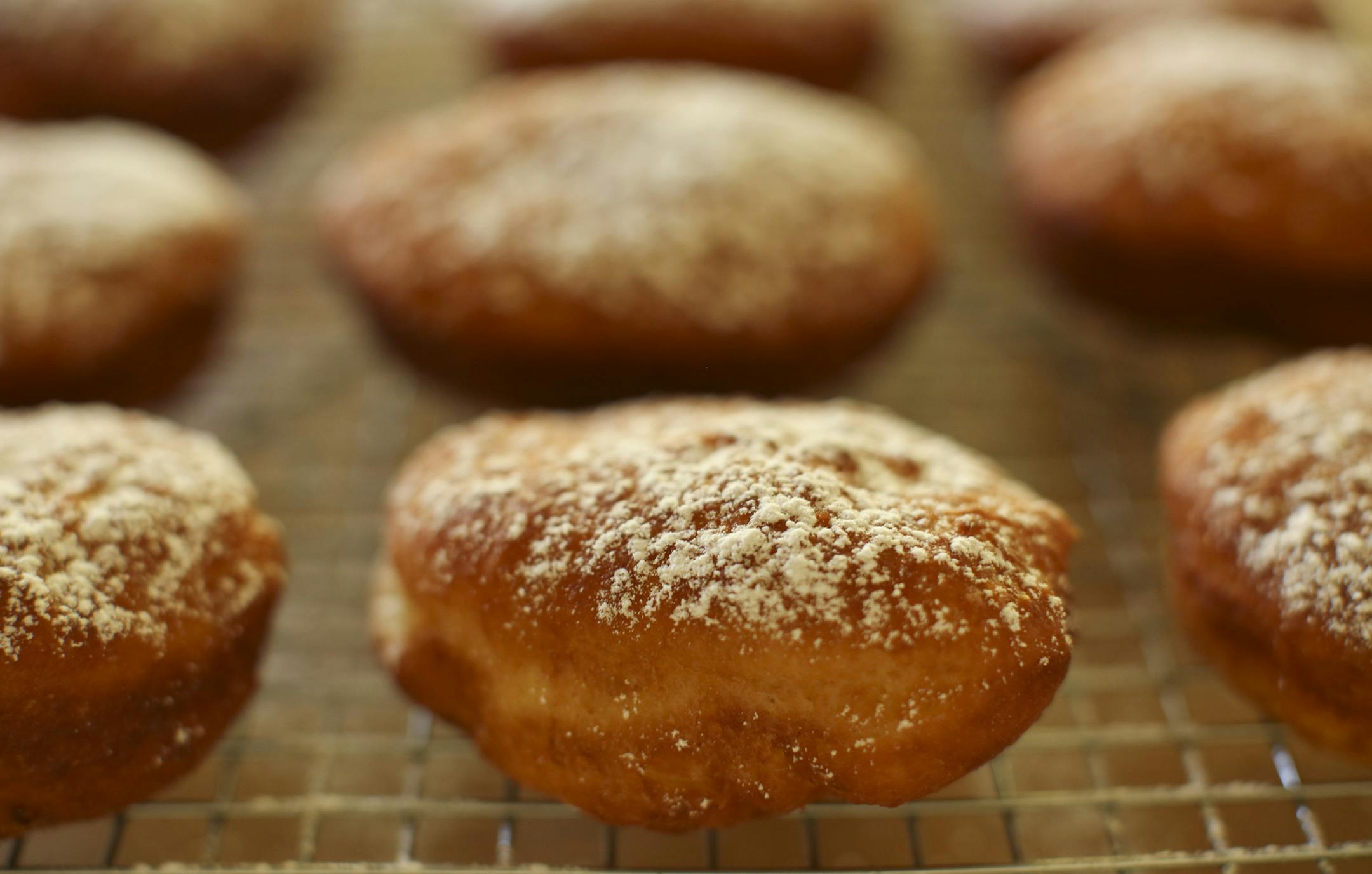 Baking Central takes on krofi, the light and lemony fried pastry from Slovenia. Krofi preparation in Kim Ode's Edina kitchen on Thursday afternoon, October 10, 2013. The finished krofi with a dusting of powdered sugar. ] JEFF WHEELER ‚Ä¢ jeff.wheeler@startribune.com