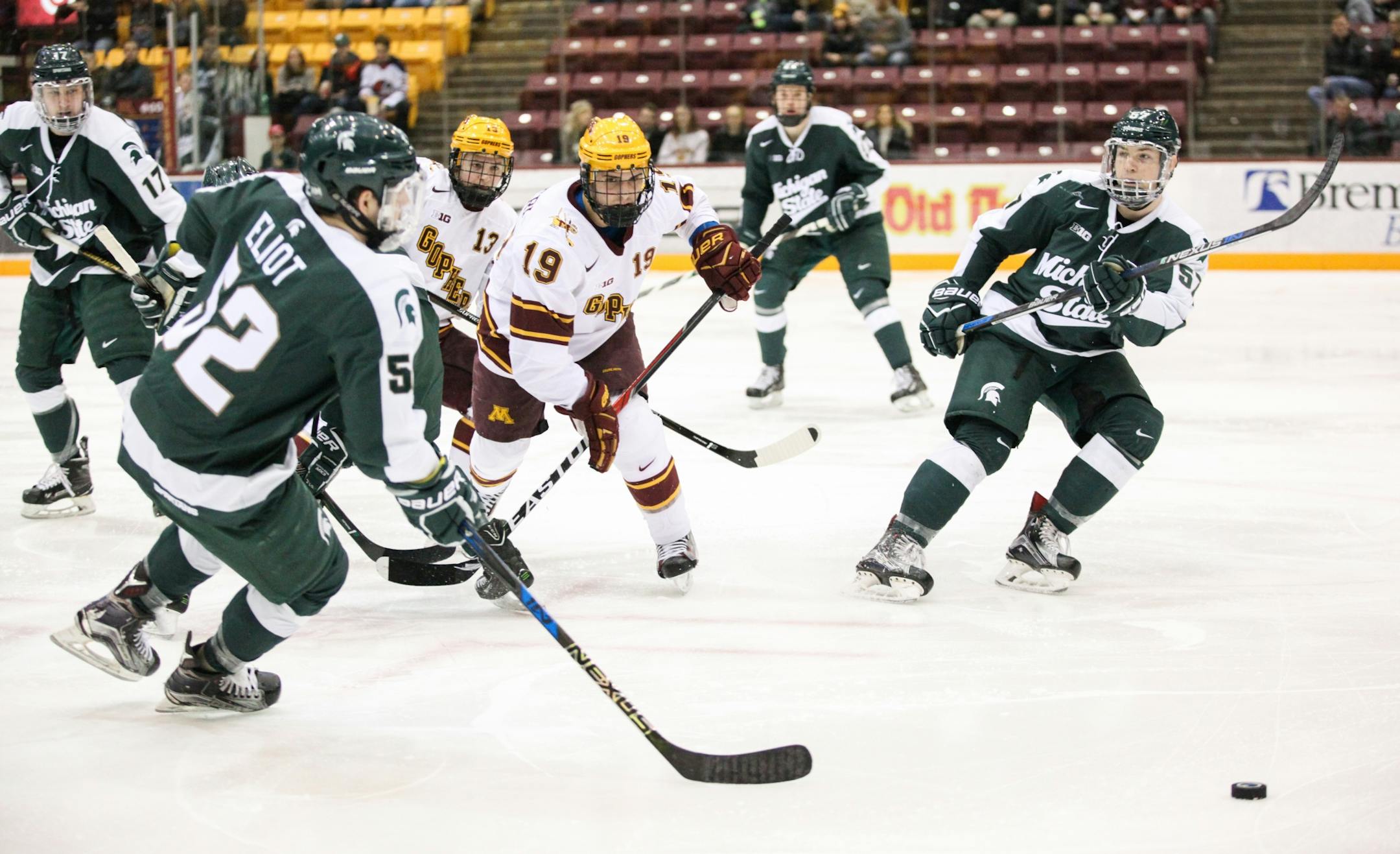 Minnesota Gophers� Vinni Lettieri (19) chases the puck in the first period.