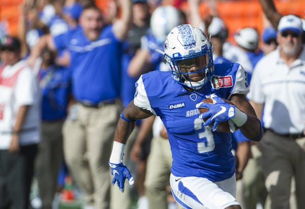 Middle Tennessee wide receiver Richie James (3) runs after catching a pass against Hawaii during the first quarter of the Hawaii Bowl NCAA college foo