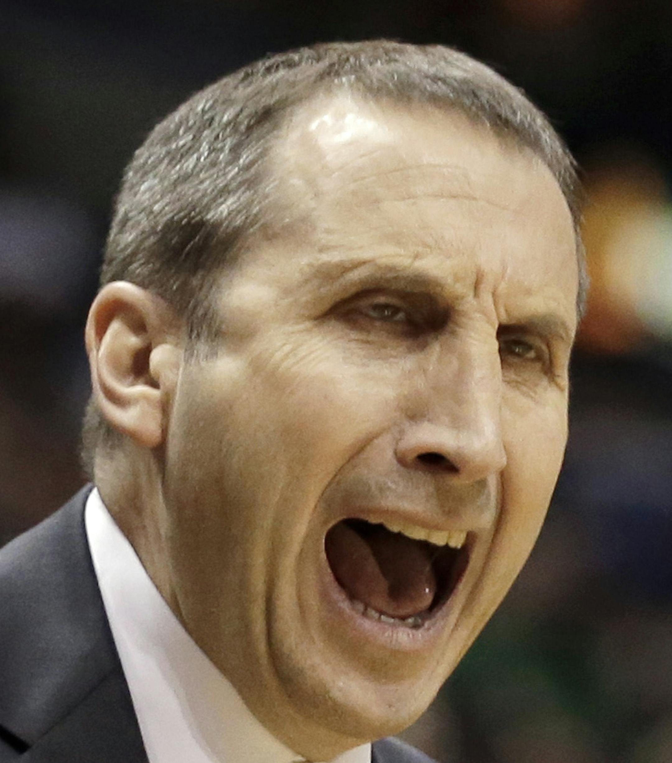 FILE - In this March 22, 2015, file photo, Cleveland Cavaliers head coach David Blatt yells from the sidelines during an NBA basketball game against the Milwaukee Bucks in Milwaukee. Blatt was all set to be an assistant coach under Steve Kerr in Golden State this season. When Cleveland came calling, Kerr encouraged Blatt to pursue the job. Now these two friends meet as first-year head coaches in the NBA Finals. (AP Photo/Aaron Gash, File)