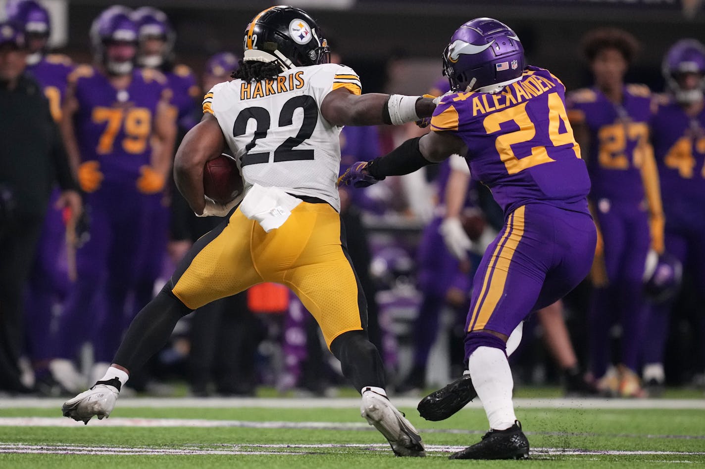 Minnesota Vikings cornerback Mackensie Alexander (24) tried to get a hand on Pittsburgh Steelers running back Najee Harris (22) as he rushed the ball in the second quarter of an NFL game between the Minnesota Vikings and the Pittsburgh Steelers Thursday, Dec. 9, 2021 at U.S. Bank Stadium in Minneapolis. ] ANTHONY SOUFFLE • anthony.souffle@startribune.com