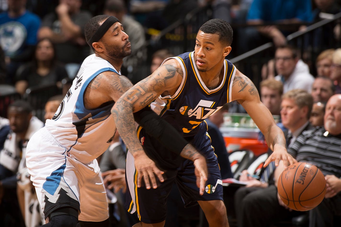 Minnesota Timberwolves guard Mo Williams (25) tries to steal the ball from Utah Jazz guard Trey Burke (3) last season.