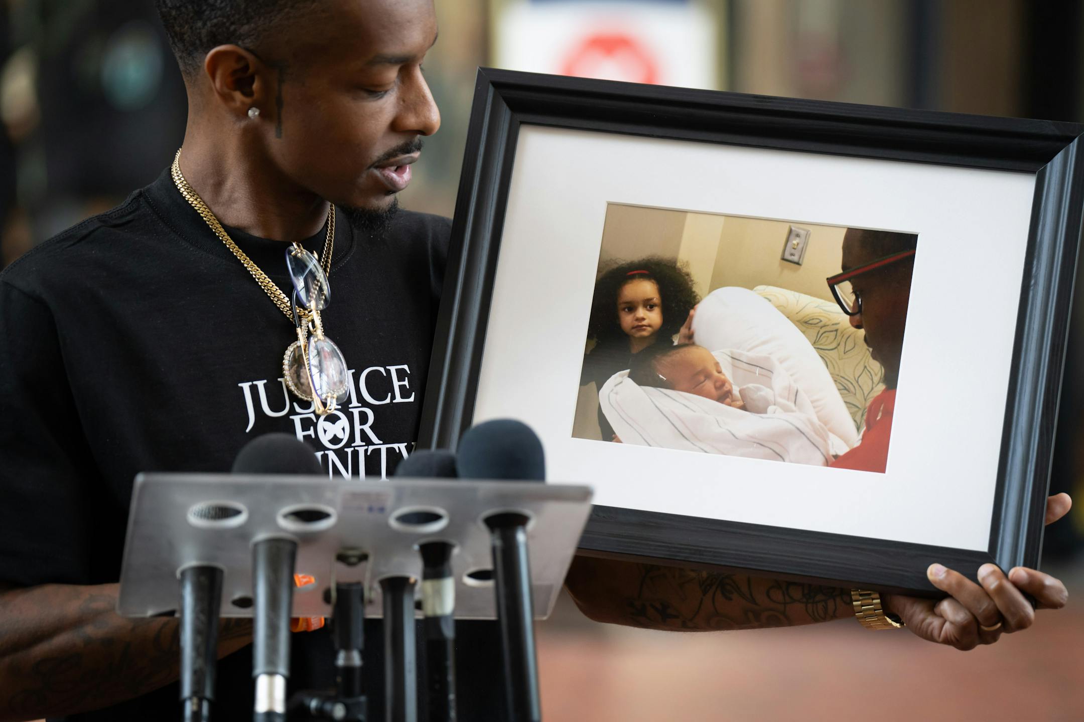 Holding his favorite photo of her, Trinity's father Raishawn Smith spoke about his daughter outside the courtroom.
