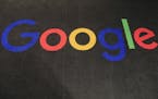 FILE - In this Monday, Nov. 18, 2019, file photo, the logo of Google is displayed on a carpet at the entrance hall of Google France in Paris. The Trum