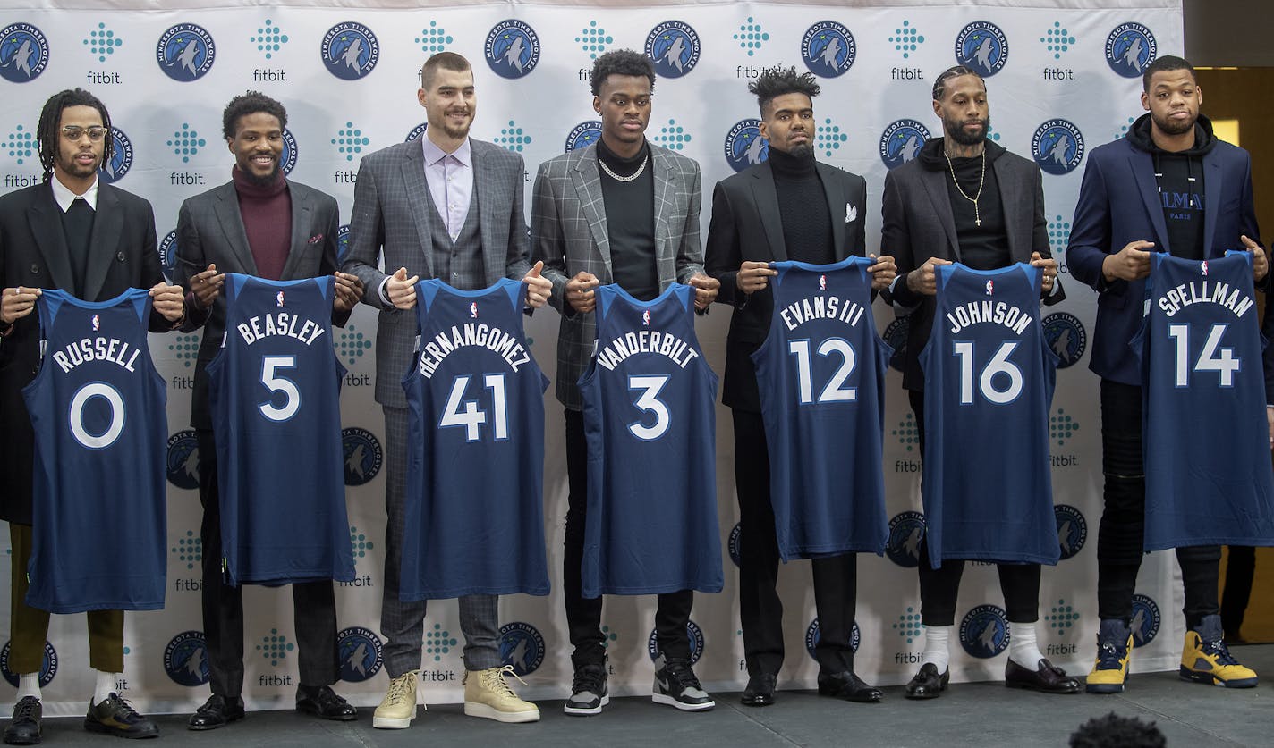 New Timberwolves, from left, D'Angelo Russel, Malik Beasely, Juancho Hernangomez, Jarred Vanderbilt, Jacob Evans III, James Johnson, and forward Omari Spellman were introduced before a press conference at the City Center