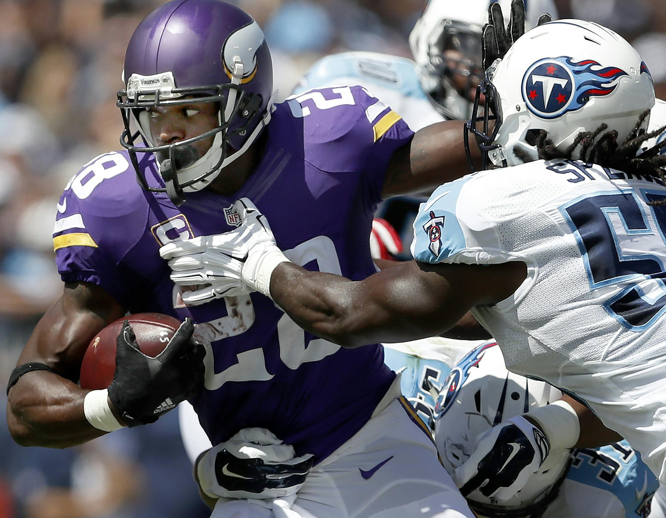 Minnesota Vikings quarterback Adrian Peterson during a run in the first quarter. ] CARLOS GONZALEZ cgonzalez@startribune.com - September 11, 2016, Nashville, TN, Nissan Stadium, NFL, Minnesota Vikings vs. Tennessee Titans