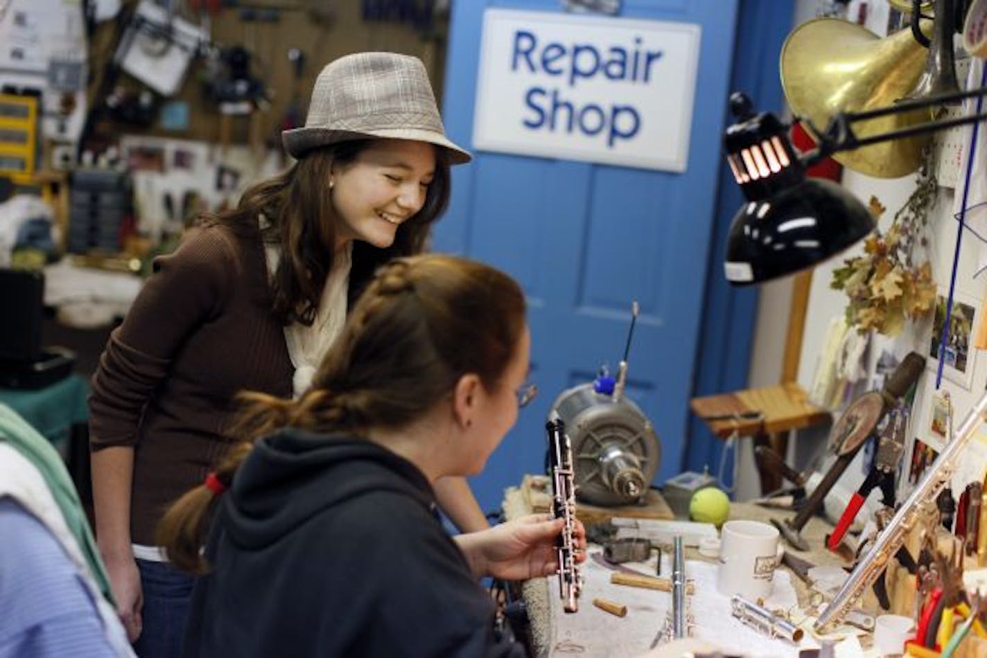 At the Cadenza Music repair shop, Madeline Reid, who is homeschooled, waited for her oboe to be repaired by Laurel Chapman, a woodwind and brass repair technician. Music helps her use both sides of her brain, said Reid.