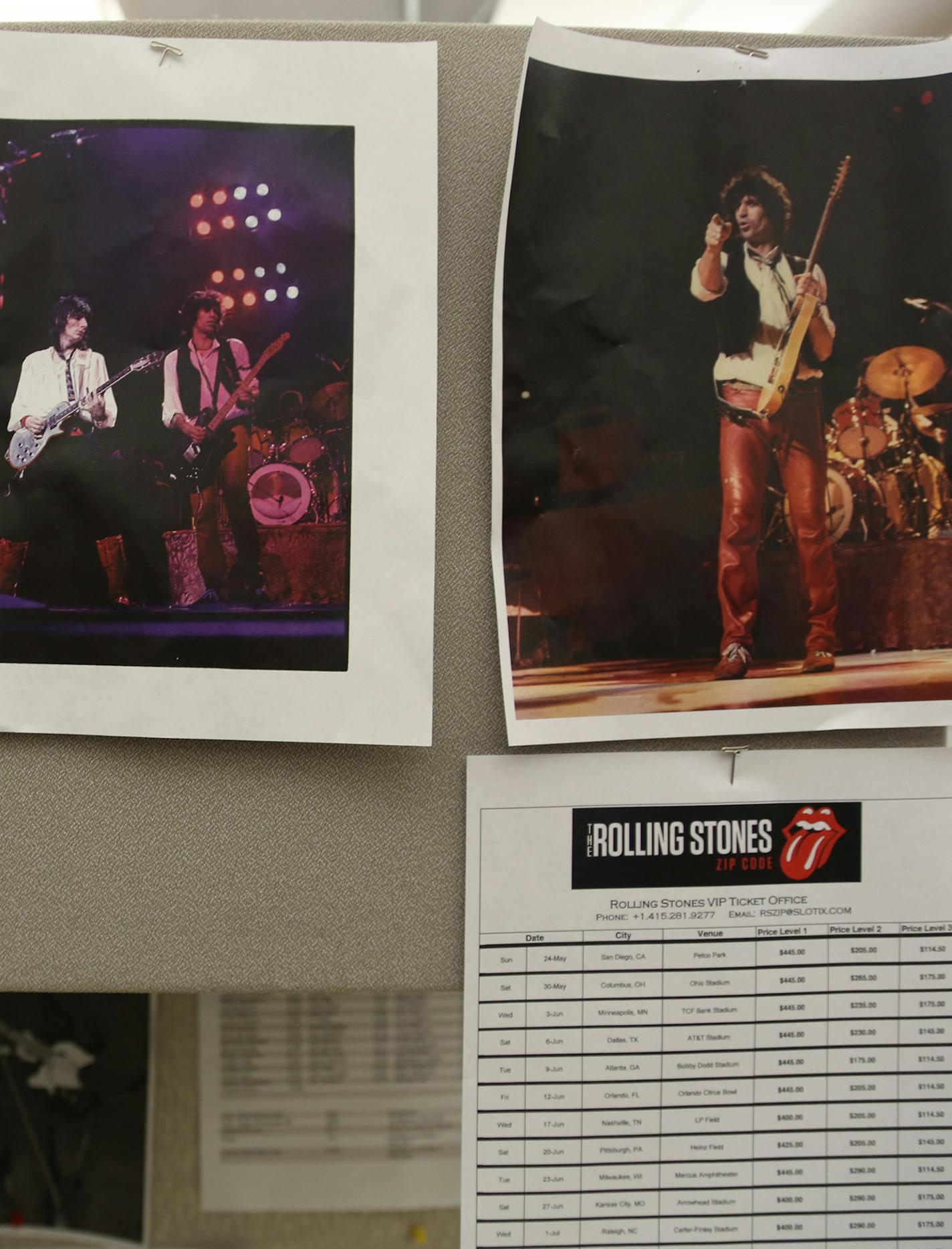 Rolling Stones fan Rob Chapman had pictures for an upcoming book in his cubicle at work. ] (KYNDELL HARKNESS/STAR TRIBUNE) kyndell.harkness@startribune.com A profile of Rolling Stones super fan Rob Chapman in Minneapolis Min., Tuesday, May 26, 2015.