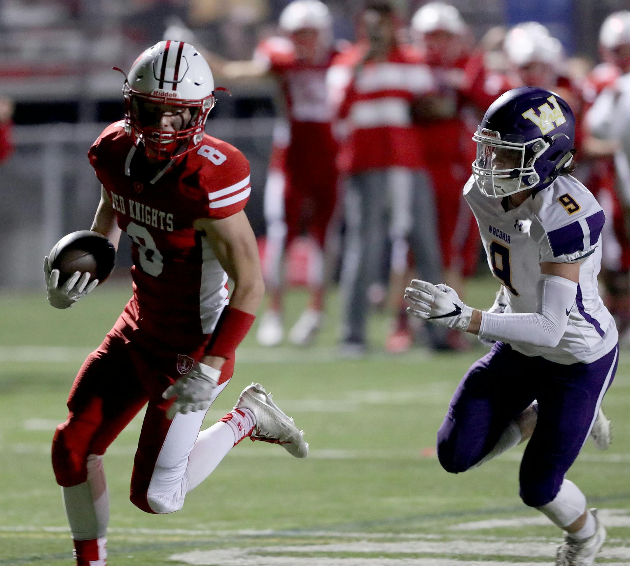 Benilde-St. Margaret receiver Clyde Sellke (8) takes the ball into the end zone after a catch and run TD, past Waconia defender Tim Stapleton (9) during the fourth quarter of BSM's 28-14 win Friday, Sept. 1, 2017 at BSM High, in St. Louis Park, MN.]
DAVID JOLES ï david.joles@startribune.com Waconia at Benilde-St. Margaret's