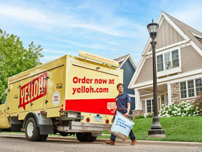 A provided artistic rendering of a Yelloh home delivery truck.