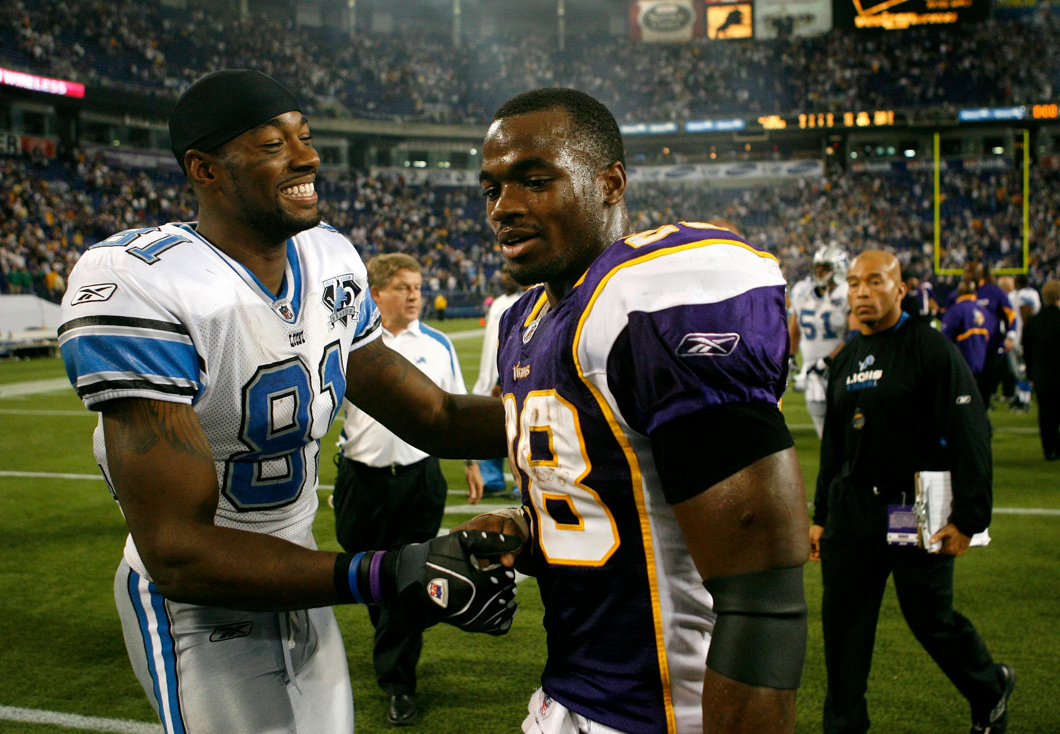 Adrian Peterson and Calvin Johnson greeted each other after the game. Despite reaching 100 yards rushing, Peterson fumbled twice and didn't score in the game.