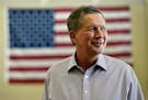 Ohio Gov. John Kasich looks on before he speaks at the Clark County Republican Party headquarters on June 11, 2015 in Las Vegas. On July 21, Kasich an