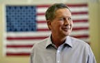 Ohio Gov. John Kasich looks on before he speaks at the Clark County Republican Party headquarters on June 11, 2015 in Las Vegas. On July 21, Kasich an