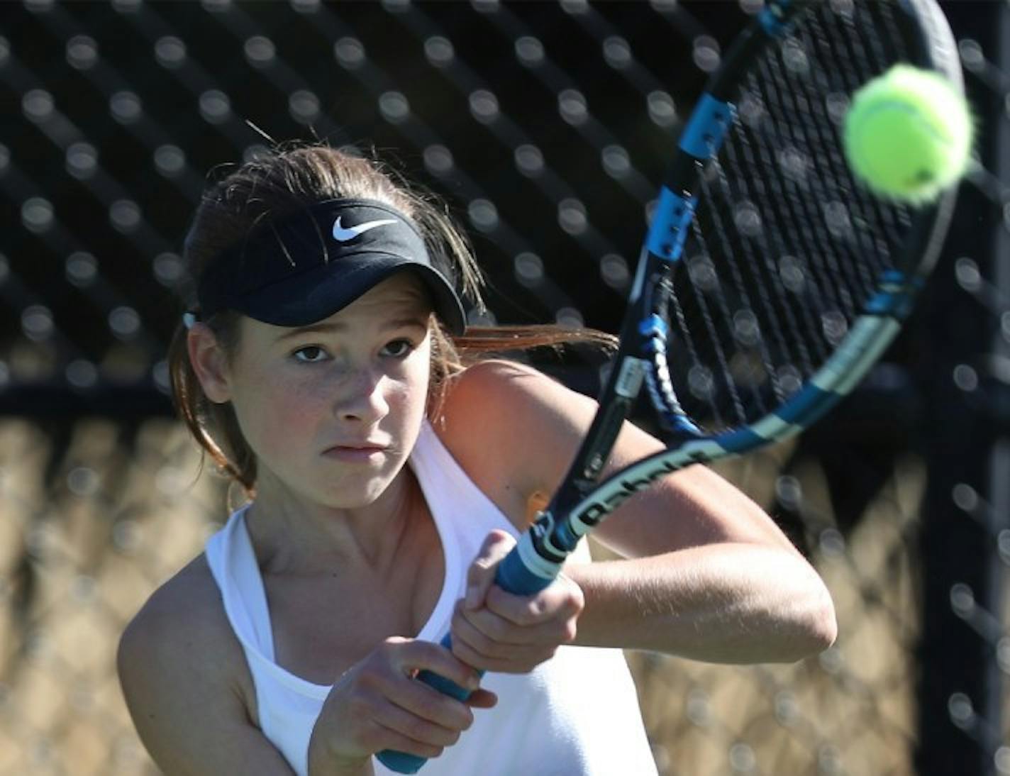 Lauren Ferg who played a match five days after appendix surgery, had to serve underhand, won her match, and helped team to conference title