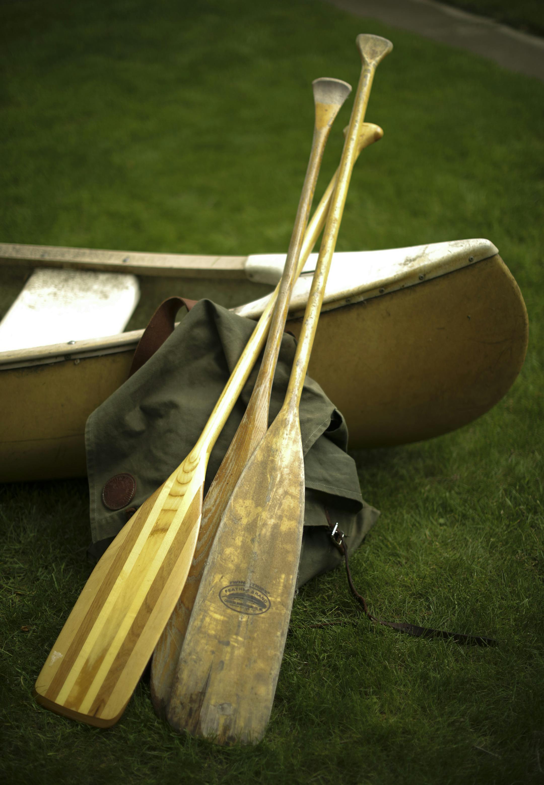 Paddles, a Duluth pack, and a canoe in Pat Aubrecht's back yard. ] JEFF WHEELER ï jeff.wheeler@startribune.com Six women who have known each other for years through their book club are going to try a canoe trip together in Canada's Quetico Provincial Park next month. Wednesday evening, May 24, 2017 they gathered at the home of one of their members, Pat Aubrecht, for a portrait. They all have camping experience, but only Allar has been canoe camping before.