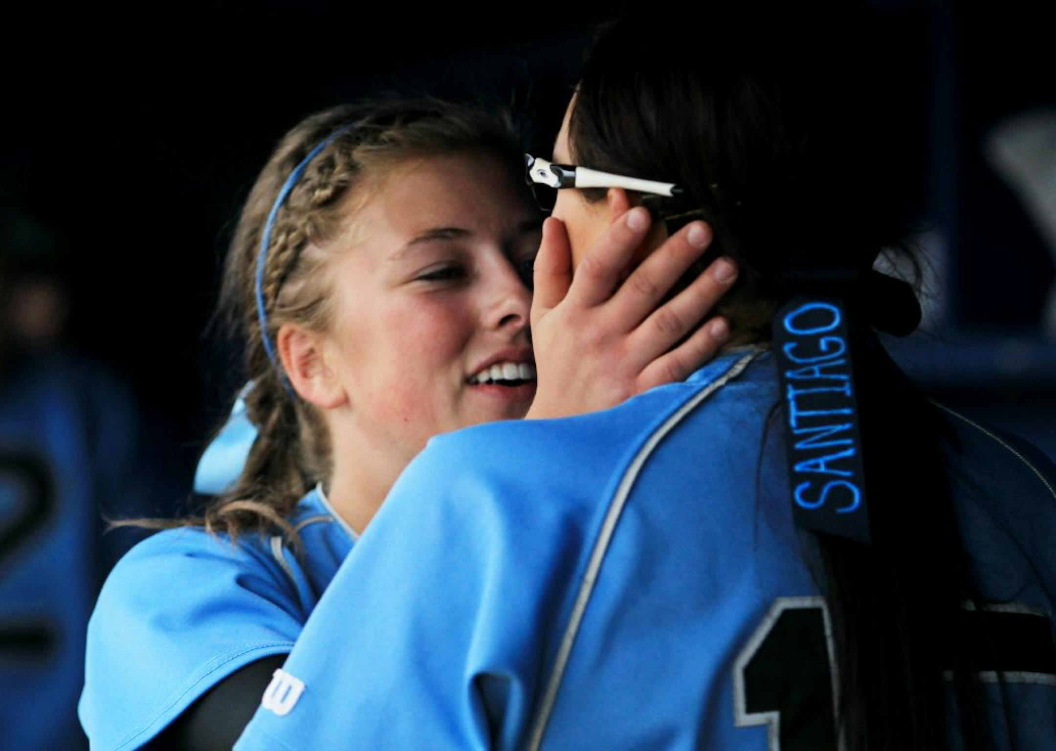 Bloomington Jefferson's Emily Carr congratulated Cassandra Santiago in the dugout after she scored during the Section 3 title game won by Jefferson 9-4 over Burnsville. Photo by RENÉE JONES SCHNEIDER • reneejones@startribune.com