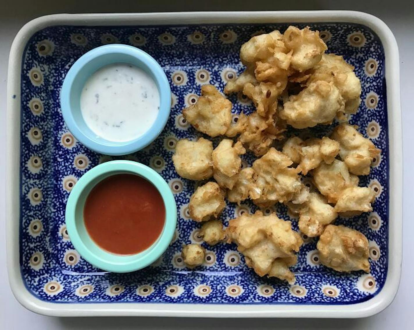 Cauliflower "wings" with Buffalo sauce and ranch sauce from Trio Plant-Based in Minneapolis.