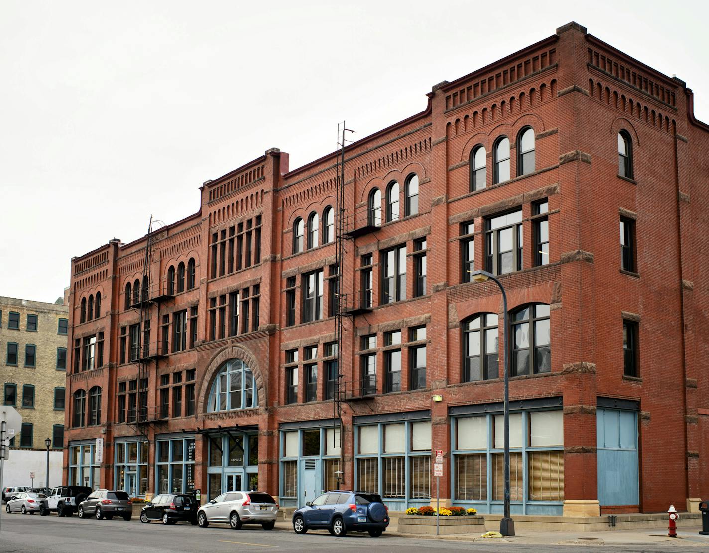 Evan Richardson with the real estate development firm Schafer Richardson. Evan is in charge of the firm's real estate investment trust. The building behind him at the corner of 1st St N and 2nd Ave N is one of the buildings they own. ] GLEN STUBBE * gstubbe@startribune.com Tuesday October 27, 2015