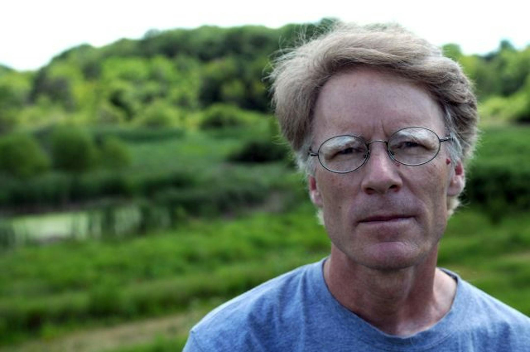 Steve Gardner numbers the trees that fall to development: "I want people to know what is going on." A DNR forestry official calls the city's policy on cutting trees too simplistic. City officials said they're trying to strike a balance.