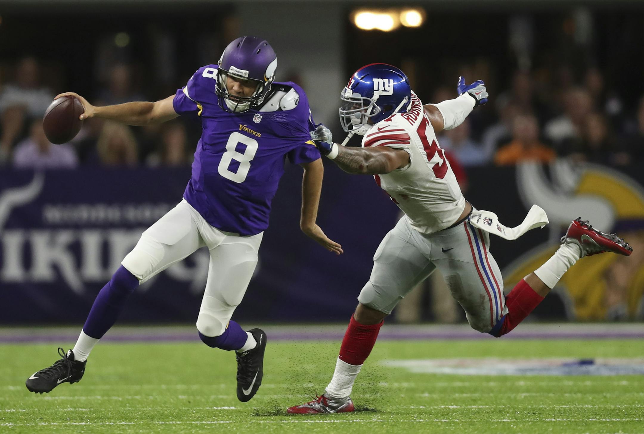 Minnesota Vikings quarterback Sam Bradford (8) scrambled while pursued by New York Giants linebacker Keenan Robinson (57) in the third quarter. ] JEFF WHEELER &#xef; jeff.wheeler@startribune.com The Vikings beat the New York Giants 24-10 in an NFL Monday Night Football game October 3, 2016 at U.S. Bank Stadium in Minneapolis.