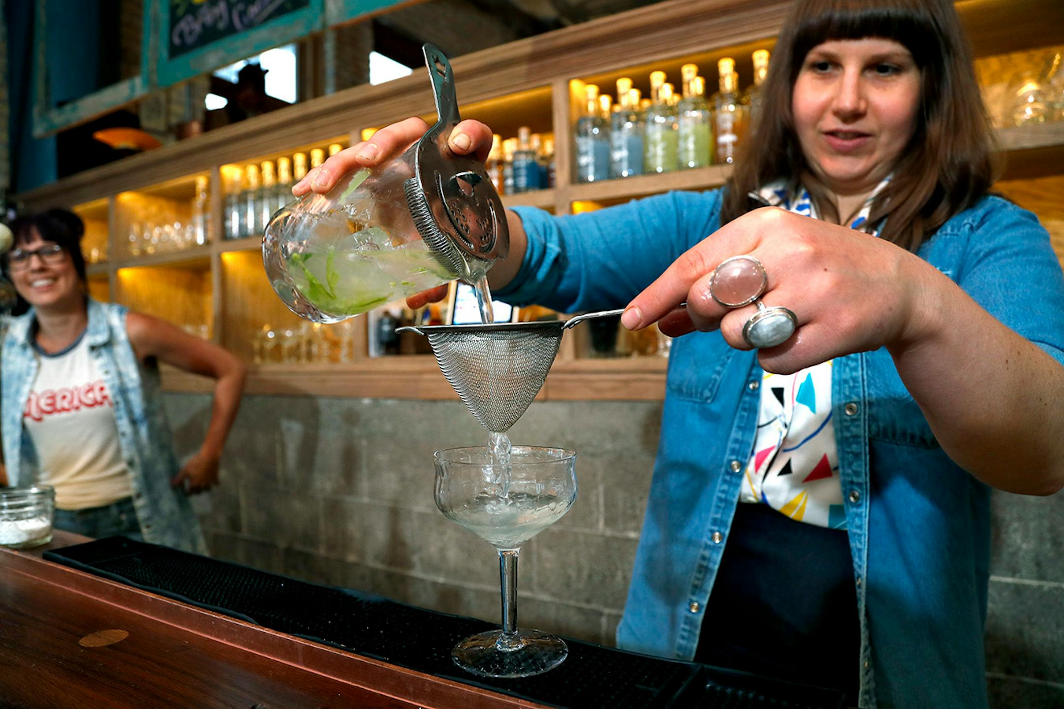 Bartender Hally Sharrow prepared a drink at Vikre Distillery in the Canal Park area of Duluth.
