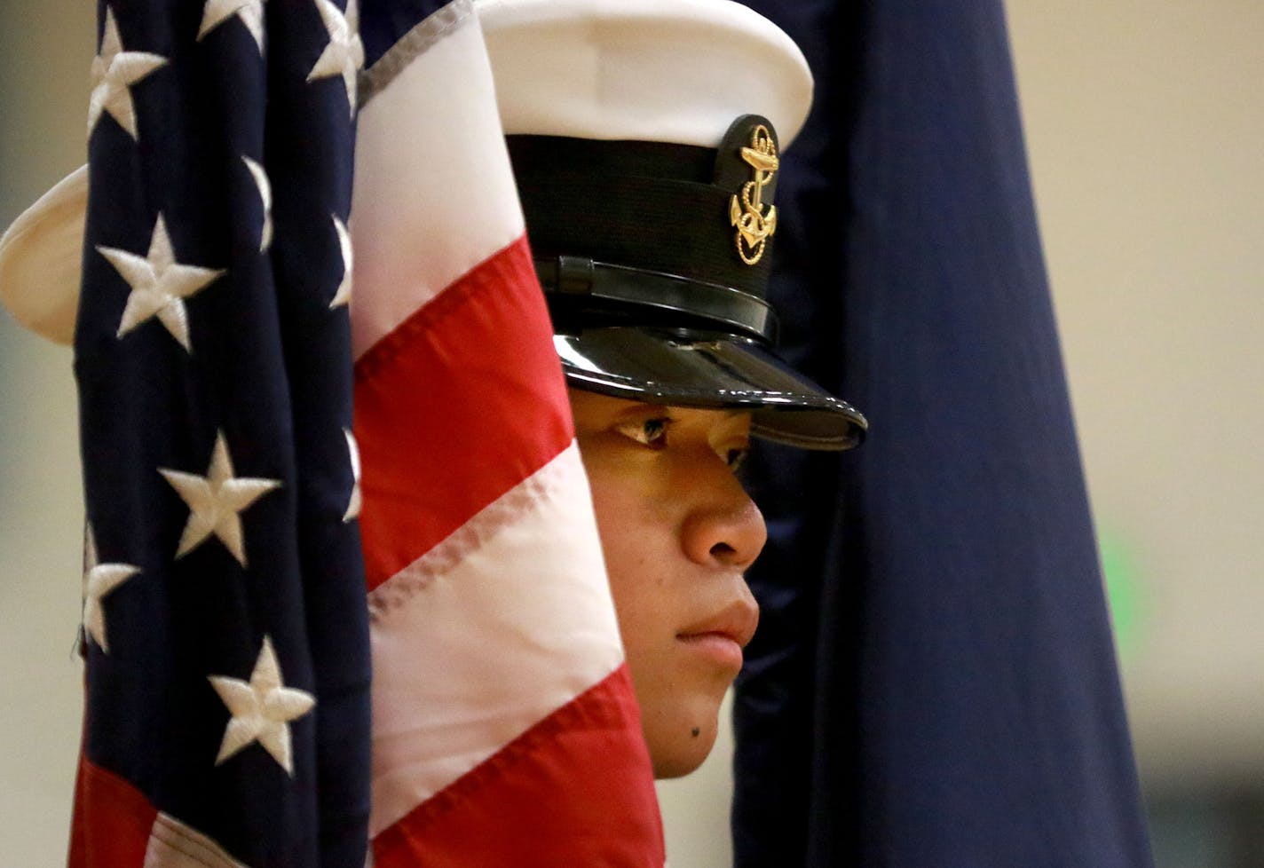 Washington Technology Magnet School Navy junior ROTC Honor Guard member James Vo, a junior, holds two flags as fellow Honor Guard members received medals during an inspection and review Thursday, Oct. 27, 2016, at Washington in St. Paul, MN.](DAVID JOLES/STARTRIBUNE)djoles@startribune.com The St. Paul school district is considering expanding its school ROTC programs to a sixth high school -- Highland Park Senior High -- in 2017-18. On Thursday night, the school will seek input on the proposal fr