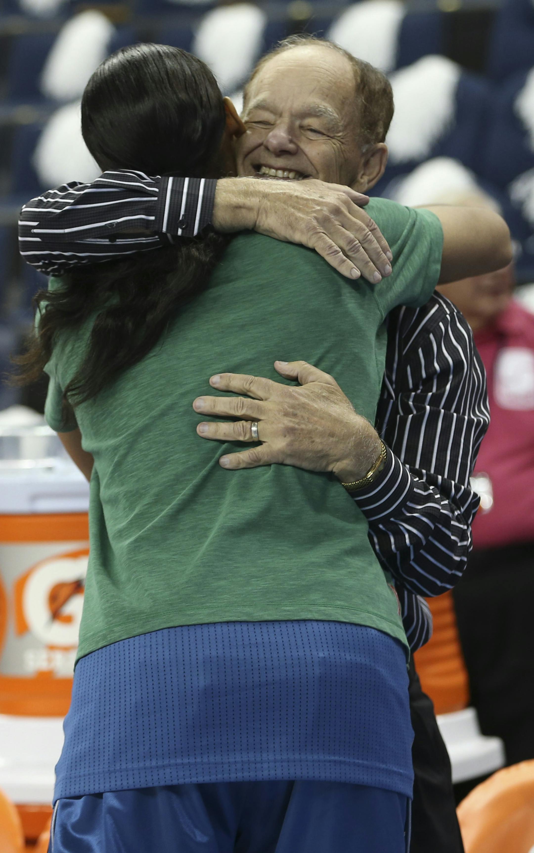 Maya Moore of the Minnesota Lynx hugs team owner Glen Taylor during warmups for Game 3 of the WNBA finals between the Minnesota Lynx and the Atlanta Dream on Thursday, October 10, 2013, at the Gwinnett Center in Duluth, Ga. ] RENEE JONES SCHNEIDER • reneejones@startribune.com NOTE: Trying to make sure this is Moore