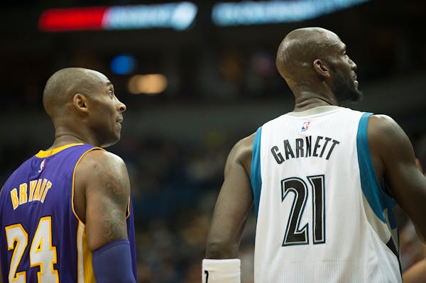 Lakers forward Kobe Bryant and Timberwolves forward Kevin Garnett stood side by side as free throws were shot in a Dec. 9 game at Target Center.