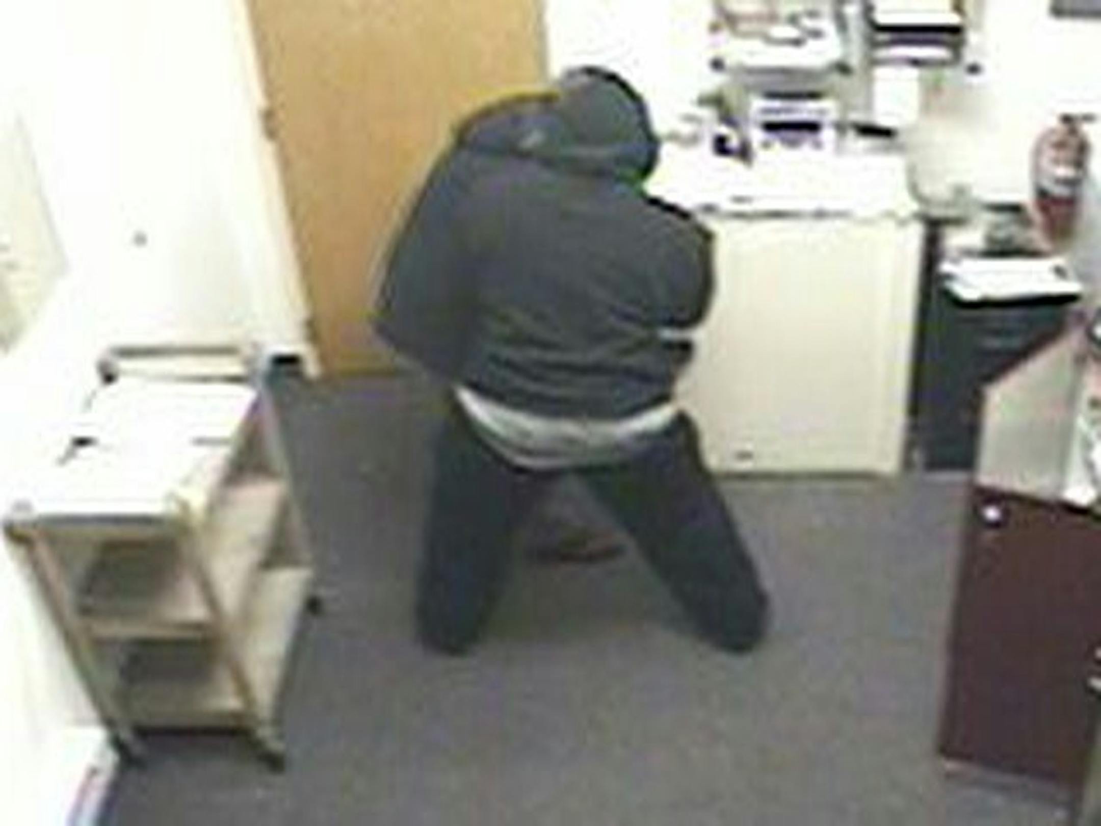 Surveillance video from Teacher Federal Credit Union in Burnsville.