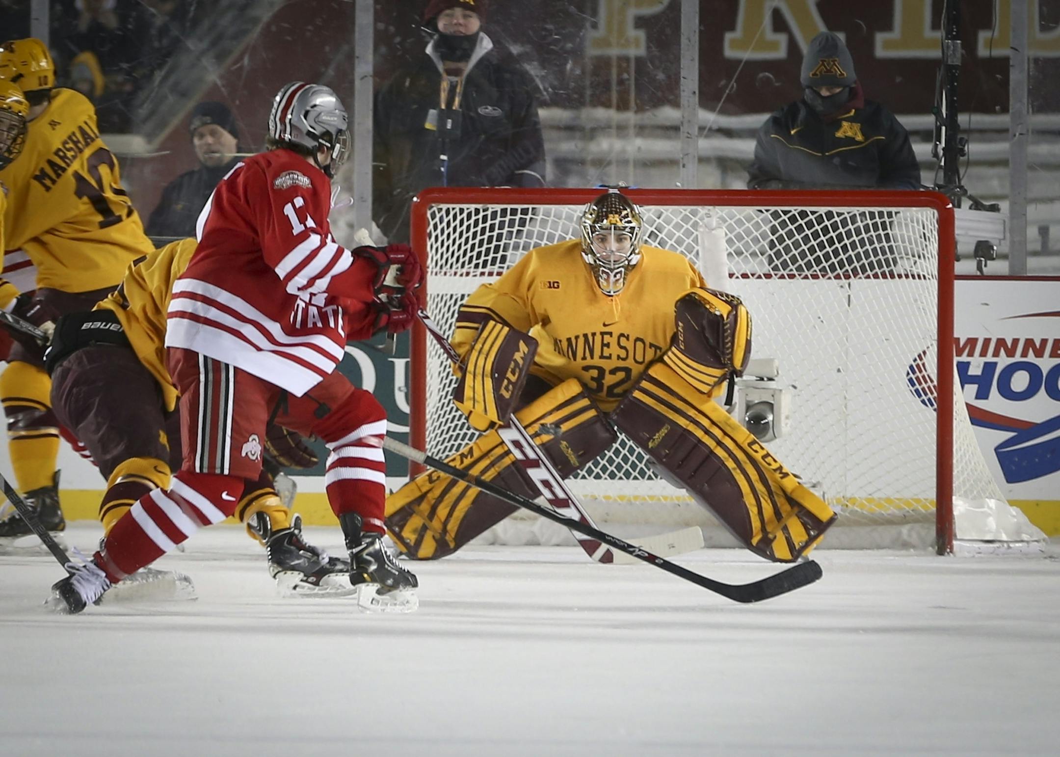 Minnesota goalie Adam Wilconx blocked a shot on goal by Ohio's Max McCormick in the first period during the Minnesota Gophers men's hockey vs. Ohio State Hockey City Classic game outdoors at TCF Bank Stadium on Friday, January 17, 2014.
