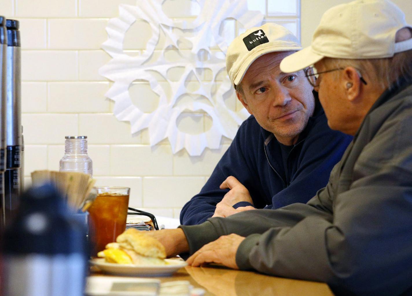 Owner Dan Swenson-Klatt, left, talked with a customer during the lunch rush in January at Butter Bakery Cafe in Minneapolis. Photo: anthony.souffle@startribune.com