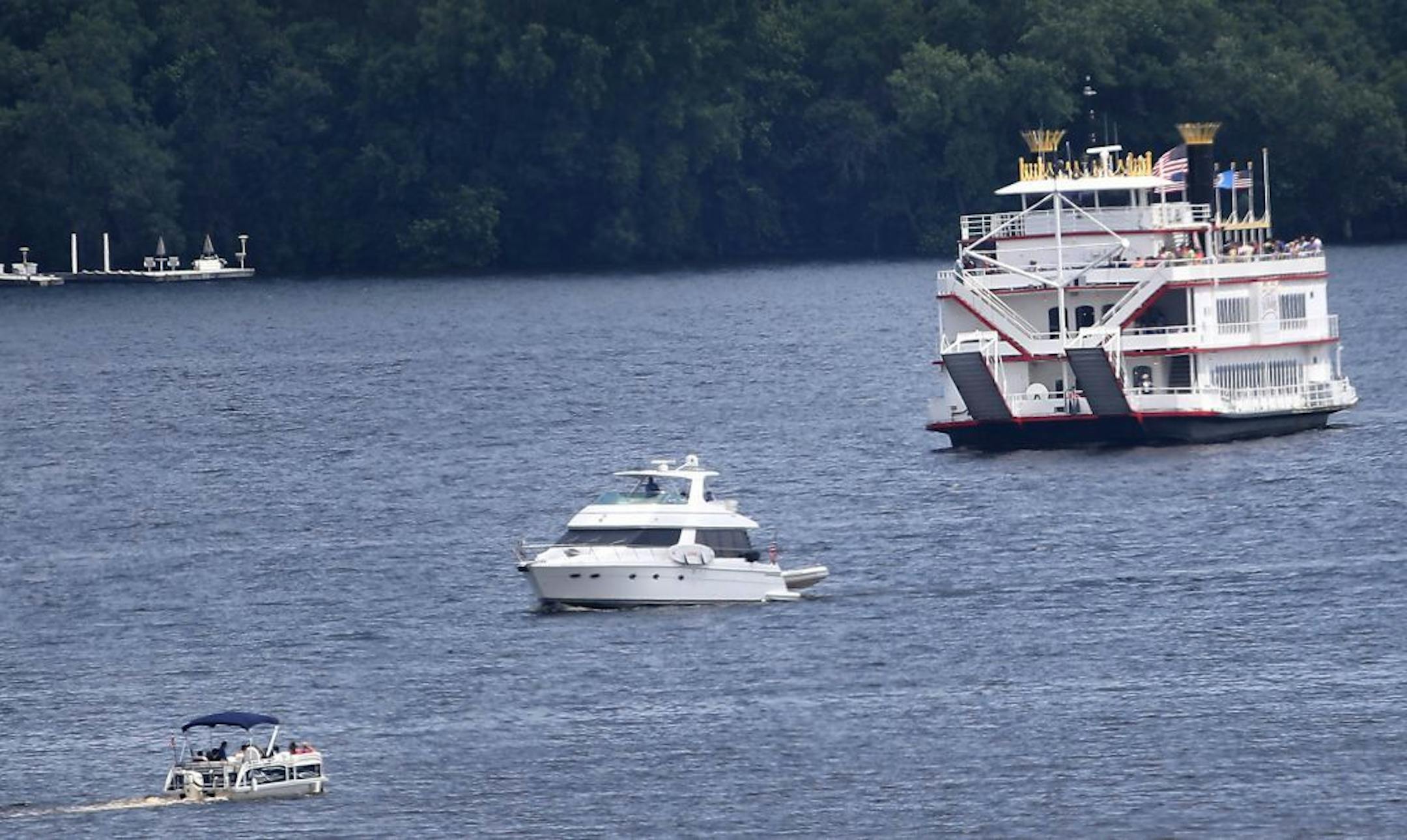 The DNR and other law enforcement agencies are kicking off Operation Dry Water, a concerted effort to crack down on drunken boaters this weekend. The goal: reducing the number of BWI accidents and fatalities. Here, high water from recent rains have resulted in a no wake zone on the St. Croix river, resulting in low boating traffic as a boats cruise the St. Croix River waters and seen from the St. Croix River bridge Thursday, June 28, 2018, in Stillwater, MN.