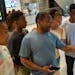 From left, Camber, Camryn, Braxton, Reggie, Valerie, and Jacori Hayes check directions at Mall of America on Friday, July 2, 2021, in Minneapolis. Jac